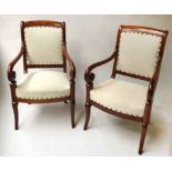 FAUTEUILS, a pair, early 19th century French Charles X mahogany studded new linen upholstery.