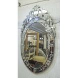 VENETIAN MIRROR, with an oval plate and decorative etched frame, 137cm H x 75cm W.