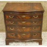 SERPENTINE CHEST, Georgian style mahogany with brushing slide above four drawers,