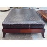 FOOTSTOOL, of substantial proportions, woven leather top on a wooden base.