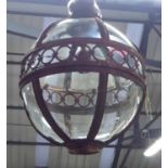 GLOBE CEILING LAMPS, in a bronzed finish, 69cm diam plus chain.