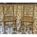 DINING CHAIRS, a set of six Regency painted beechwood with simulated bamboo frames and caned seats.