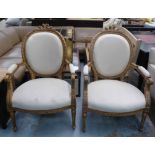 ARMCHAIRS, a pair, Louis XV style carved gilded frames, 69cm W.