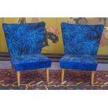 LOUNGE CHAIRS, a pair, circa 1960 beechwood in blue palm leaf patterned velvet, 64cm W.