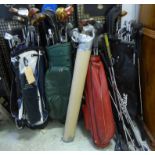 GOLF CLUBS, an extensive quantity of varying ages, to include four golf bags.