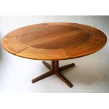 DYRLUND 'FLIP FLAP' TEAK EXPANDING TABLE, with four pull out fold out leaves,