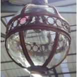 GLOBE CEILING LAMPS, in a bronzed finish, 69cm diam plus chain.