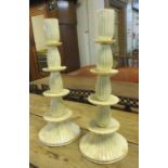 CANDLESTICKS, a pair, of tiered form, 43cm H.