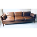 SOFA, 1970's Danish Mogensen hand finished and stitched mid brown leather with three seat cushions,