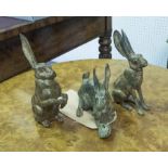 SET OF THREE BRONZE HARES BY P. CHENET, 15cm H.