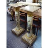 PEDESTALS, a pair, Viennese style decorated metal with brass capitals, marble tops and bases,
