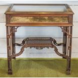 BIJOUTERIE TABLE, circa 1900, Chippendale style mahogany, with hinged glazed top, velvet lining,