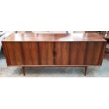 SIDEBOARD, mid 20th century rosewood with sliding tambour fronted doors, 200cm x 50cm x 87cm H.