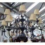 VAUGHAN DUTCH CHANDELIER, twelve light, bronze, with knife pleat silk shades, 95cm Drop.