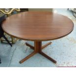 DINING TABLE, mid 20th century rosewood circular extending with two extra leaves,