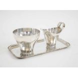 TAGE GÖTHLIN SILVER, cream jug and sugar bowl (with grill detailing at the bottom), and tray,