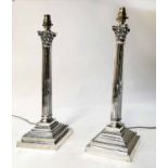 TABLE LAMPS, a pair, silver plated each with Corinthian capped reeded column and stepped plinth,