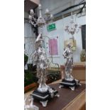 CANDELABRA AFTER JEAN-LOUIS GRÉGOIRE, a pair, silvered metal in the form of classical maidens,