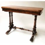 CARD TABLE, Victorian figured walnut with foldover top, turned trestle pillars and carved supports,