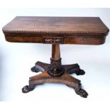 CARD TABLE, Regency rosewood foldover baize lined beaded and carved with paw supports,