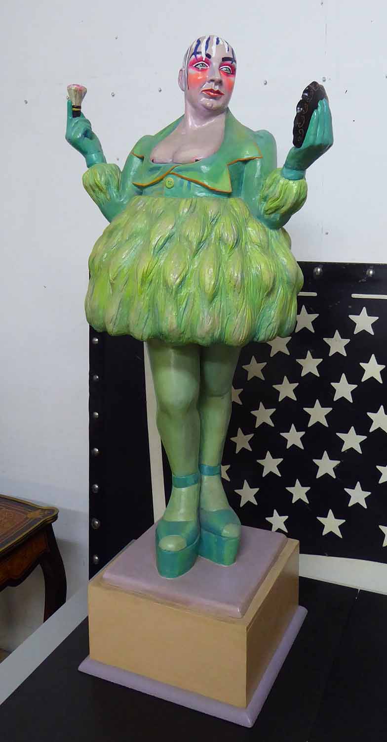 RUTH ELIA 'Leigh Bowery', wood sculpture, 110cm x 50cm x 50cm, signed on the base.