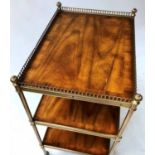 THEODORE ALEXANDER ETAGERE, three tier walnut crossbanded with gallery top finials and castors,