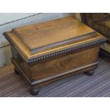 WINE COOLER, George IV mahogany with hinged gadrooned top and brass ring handles (one loose),