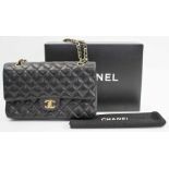 CHANEL CLASSIC FLAP BAG, black caviar leather with front double flap closure,