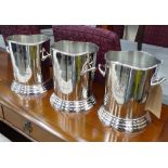 CHAMPAGNE BUCKETS, a set of three, stamped Louis Roederer, 23cm H.