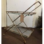 DRINKS TROLLEY, 1930's French faux bamboo gilded metal with two glass shelves, 73cm H x 38cm x 68cm.