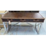 CONSOLE/DESK, Andrew Martin style in faux crocodile skin with three drawers on polished metal base,