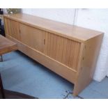 SIDEBOARD, in three sections with shelves and one with three drawers on end block supports,