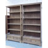 BOOKCASES, a pair, contemporary with drawers to the base, 150cm x 37cm x 22cm H.