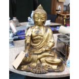 SEATED BUDDHA, 20th century gilt metal, 50cm H.