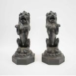 LION DOORSTOPS, a pair, Victorian cast iron, 39cm H.