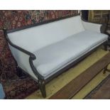 SOFA, Regency design with an ebonised reeded showframe newly upholstered in cream calico,