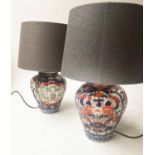 LAMPS, a matched pair, Imari style ceramic in form of ribbed vases with shades, 50cm H.