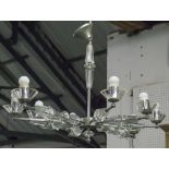 CHANDELIER, chrome and glass, of eight lights and faceted branches, 70cm H x 101cm W x 70cm D.