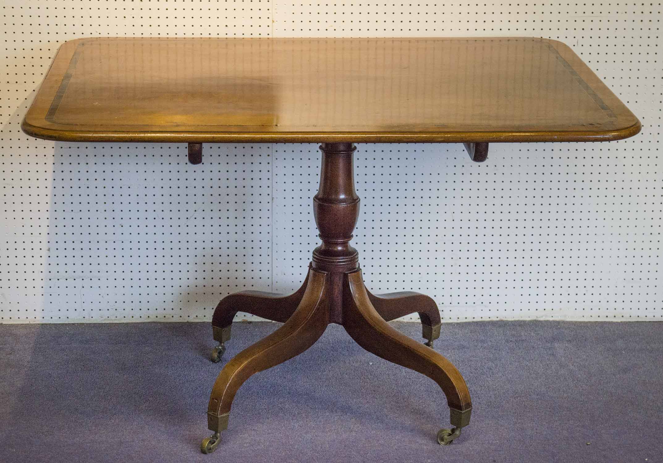 BREAKFAST TABLE, Regency mahogany with satinwood and rosewood crossbanded rectangular tilt top,