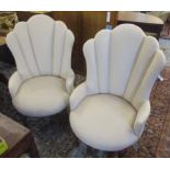 ARMCHAIRS, a pair, each with a shaped back and beige upholstery on turned front supports,