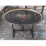 TRAY TABLE, Victorian papier mache, the oval top on ebonised stand with floral detail,