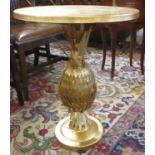 OCCASIONAL TABLE, in a gilt finish with a circular top on a 'pineapple' form base,