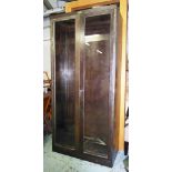 CABINET, industrial style metal with a pair of glazed doors bears plaque Mewaf Kortrijk-Courtrai,