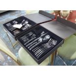 CUTLERY SETS, a pair, polished metal flatwear, boxed, 30cm x 27cm x 6cm.