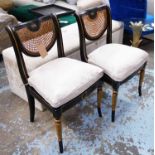 SIDE CHAIRS, a pair, ebonised with gilt detail, Hollywood regency style, 93cm H.