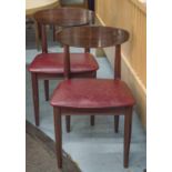 DINING CHAIRS, a set of four, by Schreiber mahogany and rosewood with red leather padded seats.