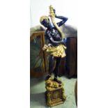 BLACKAMOOR FIGURE, modern with gilt highlights raised on faux marbelised plinth base, 159cm H.