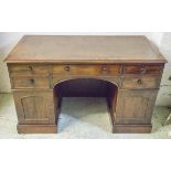 KNEEHOLE DESK, Victorian mahogany with leather top above five drawers and two doors,