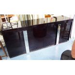 SIDEBOARD, dark Macassar ebony wood with chrome bar pull handles enclosing shelves on metal base,