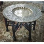 BENARES TABLE, 20th century Berber brass tray on folding base, 54cm H x 77cm.
